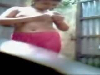 Bengali damisela tomando bañera